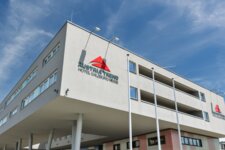 Exterior view of hotel building by day| Hotel Salzburg Messe