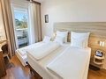 Family Room with additional bed | Hotel Salzburg Messe